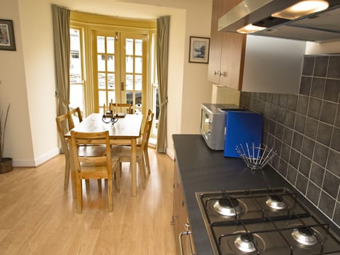 Cottage | Private kitchen | Dishwasher, highchair, cookware/dishes/utensils