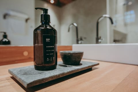 The Corner Suite | Bathroom | Designer toiletries, hair dryer, bathrobes, towels