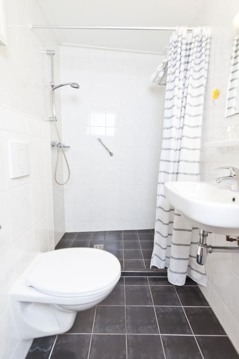 Shower, free toiletries, towels, soap