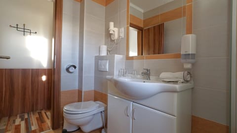 Superior Triple Room | Bathroom | Shower, hair dryer, bathrobes, towels