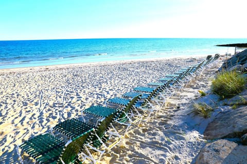 Private beach, white sand, sun loungers