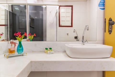 Standard Quadruple Room | Bathroom | Shower, free toiletries, towels, soap