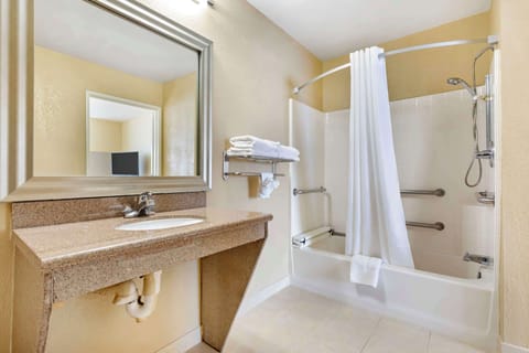 Suite, 1 King Bed, Accessible, Refrigerator & Microwave (with Sofabed) | Bathroom | Combined shower/tub, free toiletries, hair dryer, towels