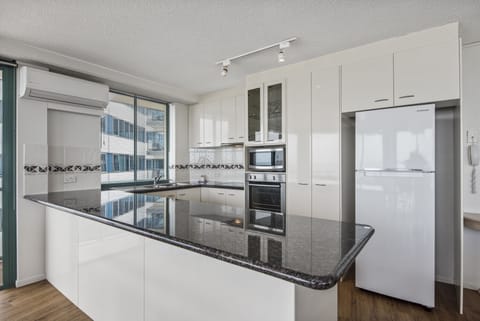 High Level Apartment, 3 Bedrooms (Levels 6-9) | Private kitchen | Full-size fridge, microwave, oven, stovetop