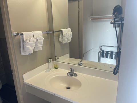 Standard Room, 2 Queen Beds | Bathroom | Hair dryer, towels