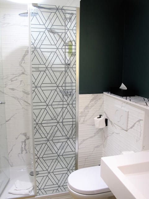 Eco-friendly toiletries, hair dryer, towels