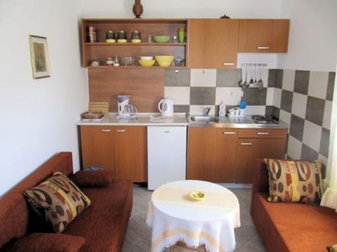 Apartment, 2 Bedrooms, Sea View (2) | Private kitchenette | Fridge, stovetop, coffee/tea maker, electric kettle