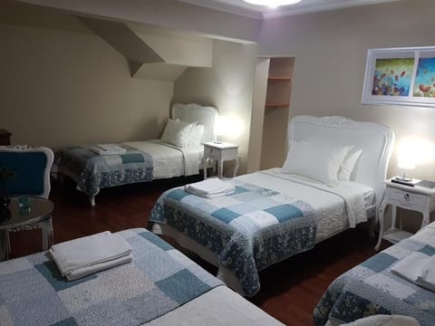 Family Quadruple Room, Private Bathroom | Free WiFi, bed sheets