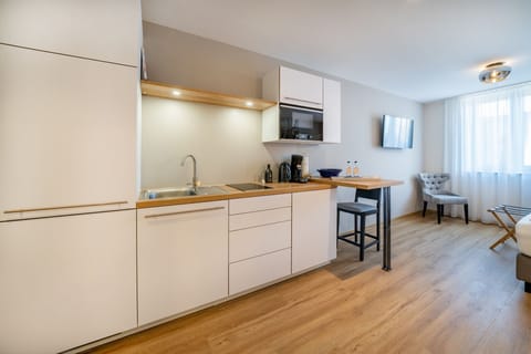 Junior Double Room | Private kitchen | Fridge, microwave, stovetop, espresso maker