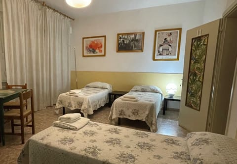 Triple Room, Shared Bathroom | Individually furnished, free WiFi