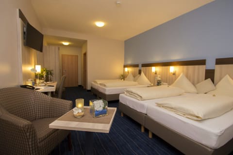 Superior Quadruple Room, 1 Bedroom, Non Smoking | Hypo-allergenic bedding, in-room safe, individually decorated