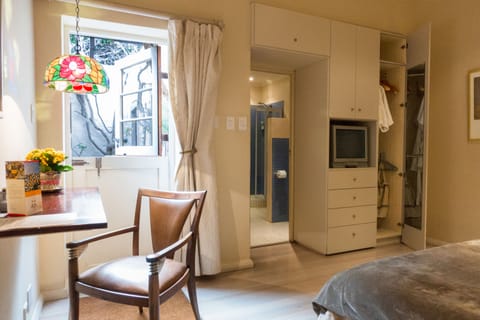 Standard Double or Twin Room | Living area | 75-cm flat-screen TV with satellite channels, TV