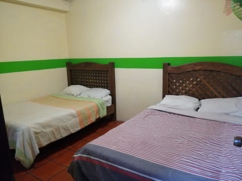 Basic Quadruple Room, 2 Double Beds | Free WiFi