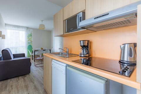 Apartment, 2 Bedrooms | Private kitchen | Fridge, microwave, coffee/tea maker, highchair