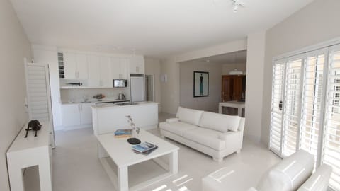 Deluxe Apartment, 3 Bedrooms, Kitchen, Ocean View | Shared kitchen | Full-size fridge, microwave, oven, stovetop