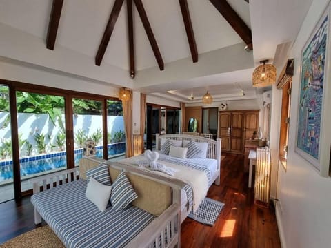 One Bedroom Beachfront Pool Villa | In-room safe, desk, blackout drapes, soundproofing