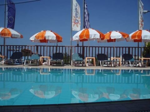 Seasonal outdoor pool, pool umbrellas, sun loungers