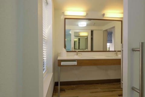 Suite, 1 King Bed, Accessible (Mobility & Hearing, Shower) | Bathroom | Free toiletries, hair dryer, towels