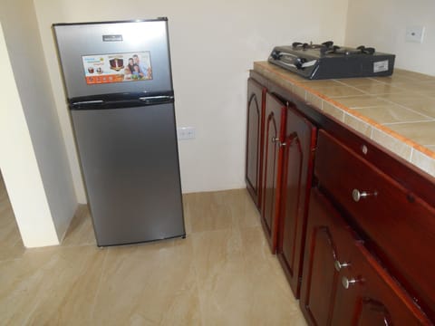 Fridge, stovetop, coffee/tea maker, cookware/dishes/utensils