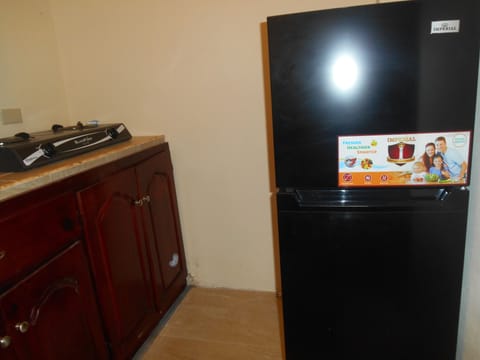 Fridge, stovetop, coffee/tea maker, cookware/dishes/utensils