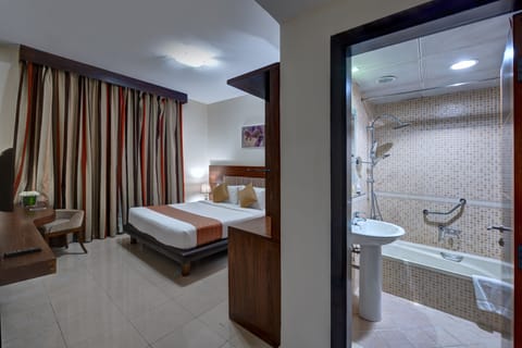Suite, 2 Bedrooms, City View | Down comforters, memory foam beds, minibar, in-room safe