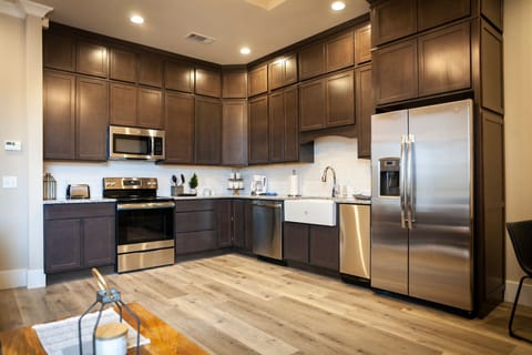 Suite, 2 Bedrooms | Private kitchen | Fridge, microwave, dishwasher, coffee/tea maker