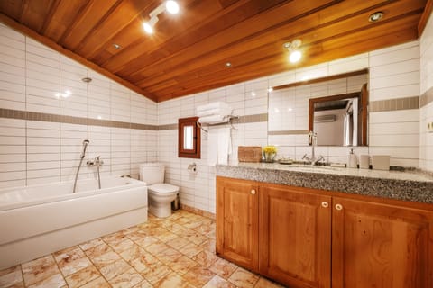 Deluxe Villa, 2 Bedrooms | Bathroom | Designer toiletries, hair dryer, slippers, towels