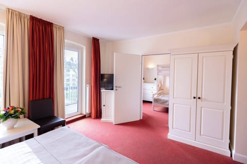 Family Quadruple Room | Minibar, in-room safe, desk, free WiFi