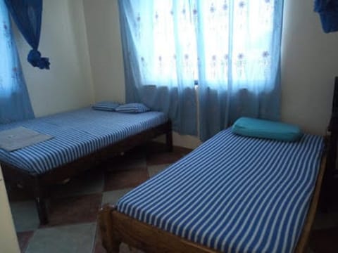 Twin Room | Desk, blackout drapes, free WiFi, bed sheets