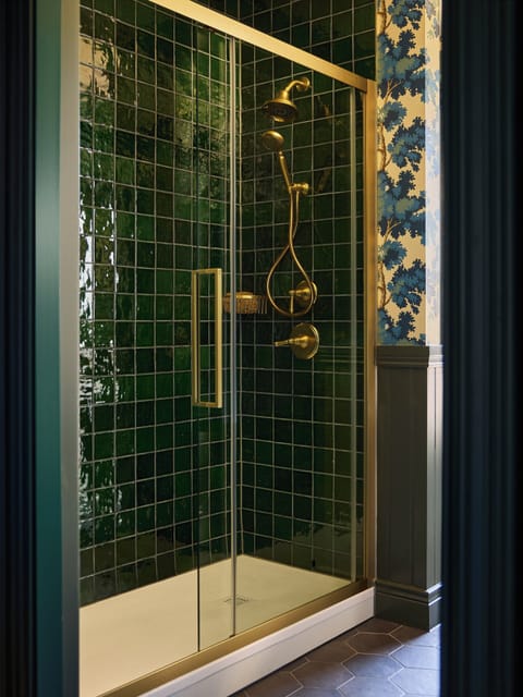 Designer toiletries, hair dryer, bathrobes, slippers