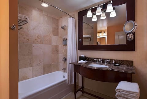 Combined shower/tub, designer toiletries, hair dryer, towels