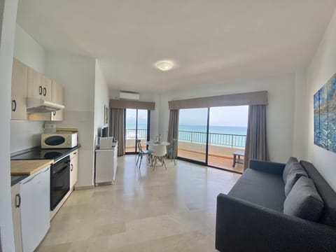 Premium Apartment, Sea View, Beachside | Private kitchen | Fridge, microwave, stovetop, espresso maker