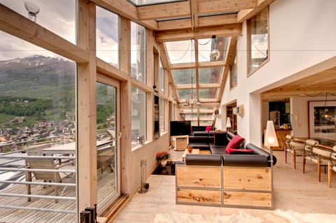 Luxury Penthouse, 4 Bedrooms, Ensuite, Mountain View (Heinz Julen Penthouse) | Living area | Flat-screen TV, DVD player