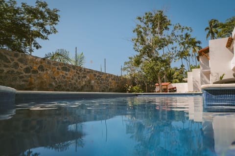 2 outdoor pools, sun loungers