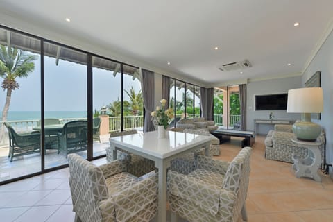 Luxury Seafront Two-Bedroom Family Suite | Living area | 32-inch LCD TV with cable channels, TV