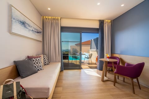 Junior Suite, Private Pool | Minibar, in-room safe, desk, soundproofing