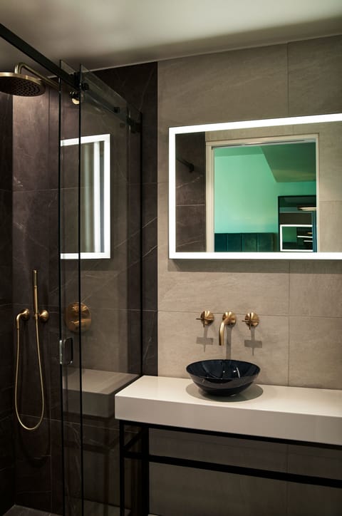 Eco-friendly toiletries, hair dryer, heated floors, towels