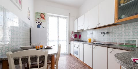 Apartment, 2 Bedrooms | Private kitchen | Fridge, microwave, oven, stovetop