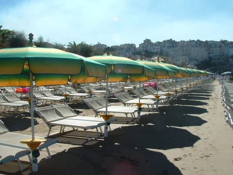 Private beach nearby, white sand, sun loungers, beach umbrellas