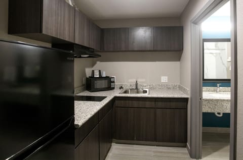 Room, 1 King Bed | Private kitchenette | Full-size fridge, microwave, coffee/tea maker