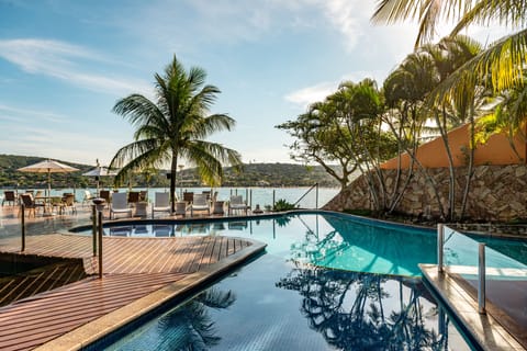 Outdoor pool, pool umbrellas, sun loungers