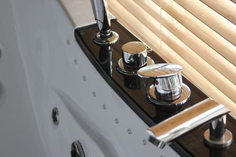 Honeymoon Loft | Bathroom | Free toiletries, hair dryer, towels