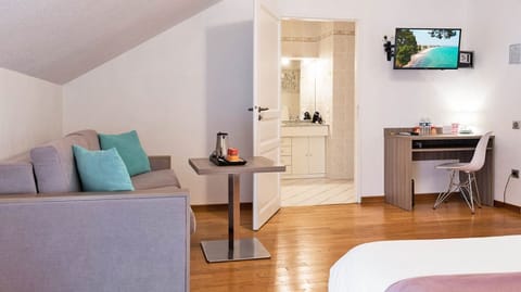 Family Room, Jetted Tub | Desk, blackout drapes, soundproofing, iron/ironing board