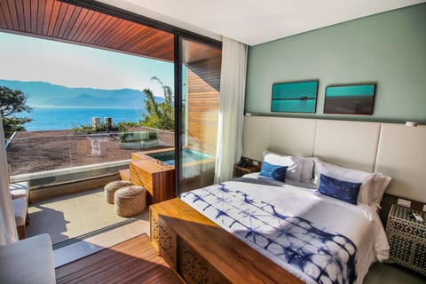 Deluxe Double Room, Ocean View | Premium bedding, minibar, in-room safe, desk