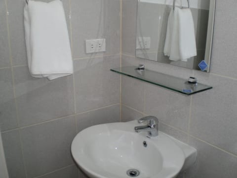 Deluxe Studio, 2 Queen Beds, Kitchenette, City View | Bathroom | Shower, free toiletries, hair dryer, slippers