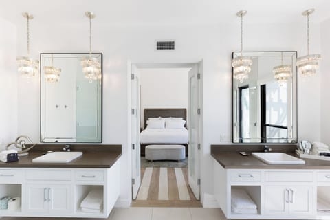 Modern Romance | Bathroom | Shower, rainfall showerhead, hair dryer, bathrobes