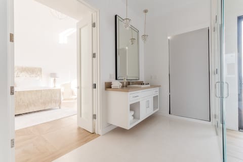 Contemporary Elegance | Bathroom | Hair dryer, bathrobes, towels, soap