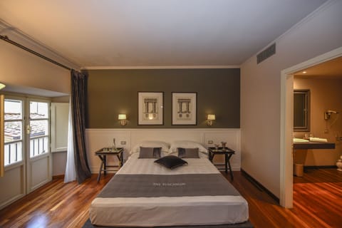 Standard Double Room | Minibar, in-room safe, individually furnished, blackout drapes