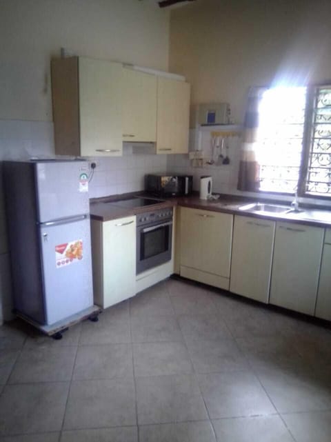 Comfort Apartment | Private kitchen | Full-size fridge, microwave, stovetop, electric kettle