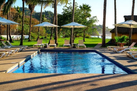 Outdoor pool, open 9:00 AM to 9:00 PM, sun loungers